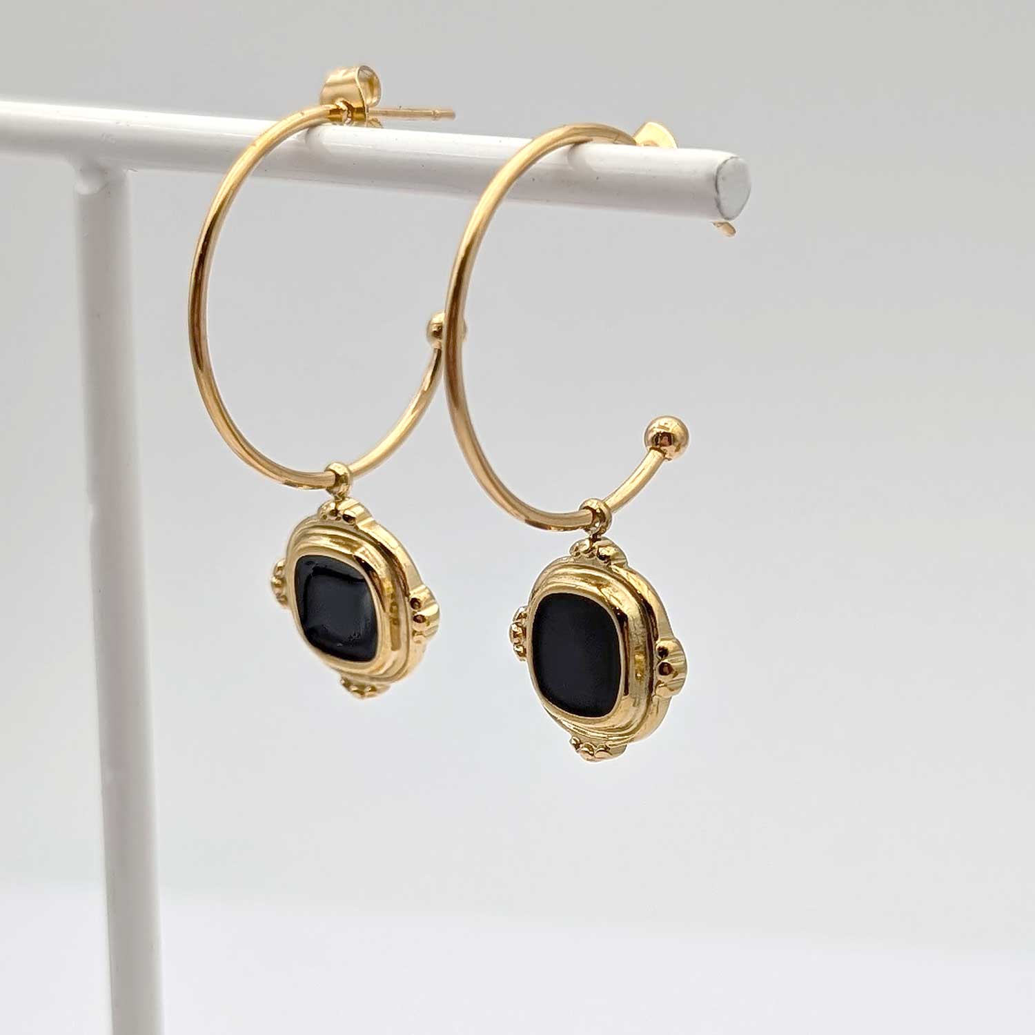 créoles styles art deco années 20 noir et doré acier inoxydable